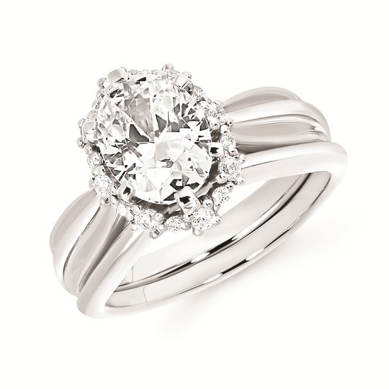 Featured image for “14k Wedding Set with Oval Center and Halo”